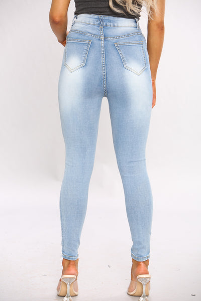 Light Blue Wash Skinny Jeans With Raw Hem